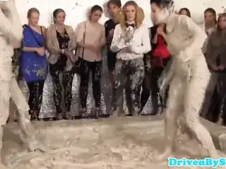 Two european beauties wrestling in mud