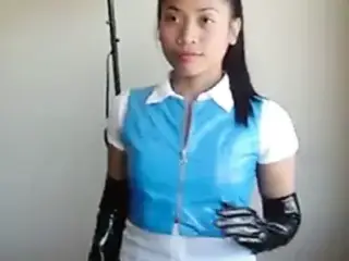 Asian in blue PVC skirt and top