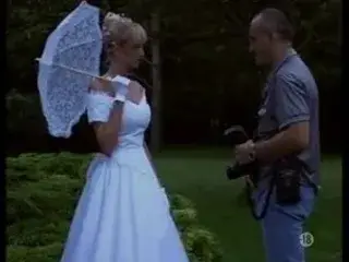 The bride in stockings outdoor