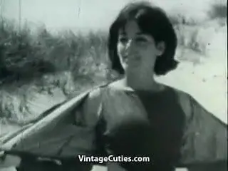 Nudist Girl's Day on a Beach (1960s Vintage)