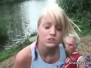 Gorgeous blonde rides dick on the river shore