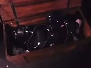 Bondage Latex girl locked in box