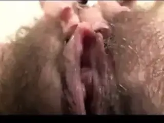Sexy hairy babe makes herself cum