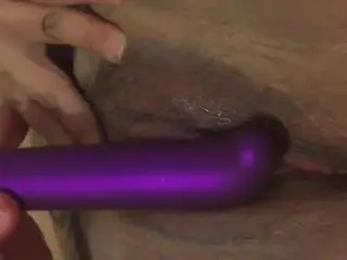 Playing with her clit