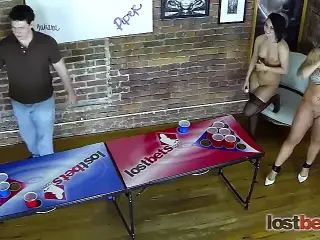 4 Beautiful girls play a game of strip beer pong