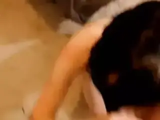 Hot masked babe giving a blowjob