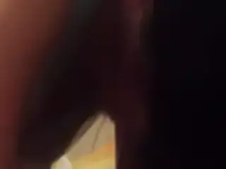 Asian girl sucking her boyfriend's cock