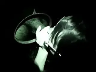 Nerdy glasses girl blows in the gloryhole