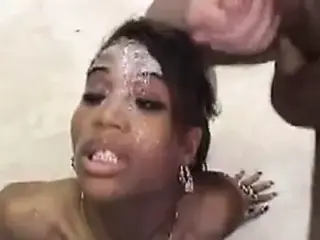 Black Slut Takes Heavy Cum Facials From White Cocks