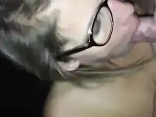 Wearing glasses while sucking me till I cum in her