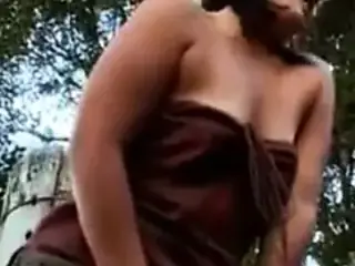 Chubby chick rubs while standing