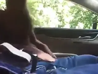 Excited Blonde Blowing In A Car