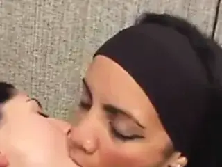 Deep Kissing between mature and young lesbians