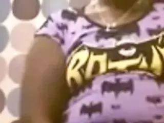 Black BBW masturbates while standing