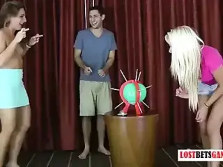 2 girls and one guy play a don't pop the balloon game