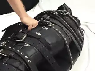 Bound with 20 belts and made to cum in a leather s