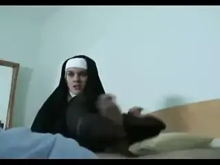 Nun giving a Nylon Footjob