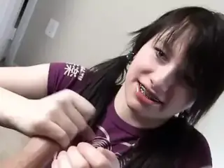 Pigtailed cutie handjob