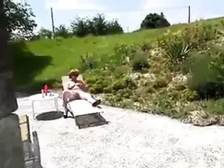 Blonde MILF in stockings sunbathing and more!