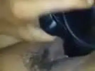 milf playing with black toy and squirting