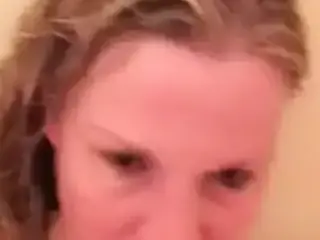 MILF getting a facial in the shower