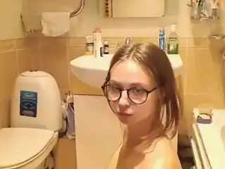College Babe Giving Head in the Bathroom