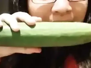 Teasing fat bitch takes a cucumber