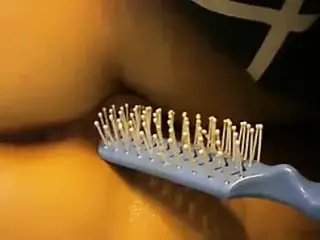 Hot chick get brush shoved up her cunt