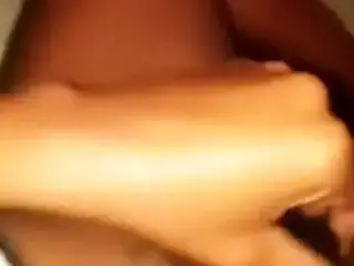 Haitian chick fingering her bushy pussy