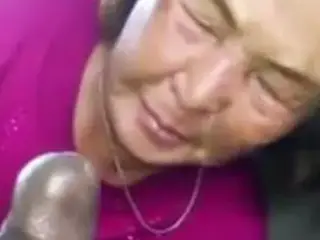 Asian Granny Sucks Black Cock In The Car