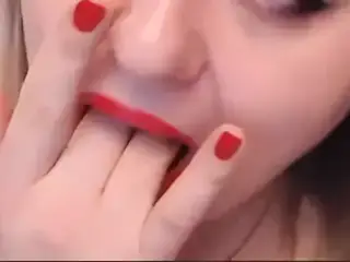 Red woman masturbates and plays and cums