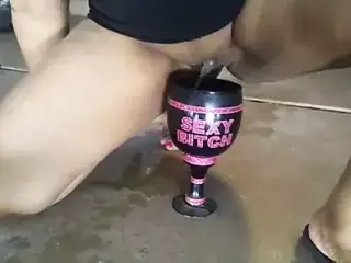 Pissing in her Sexy Bitch Cup