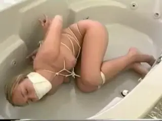 Jacqueline Lovell - bondage in the bathroom