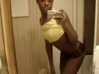 Ebony hottie films herself in the mirror