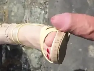 Footjob in public