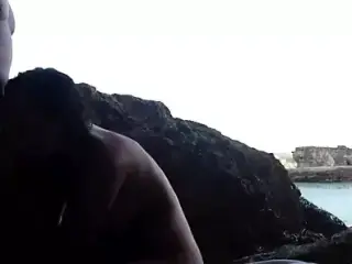 Couple having sex on the beach