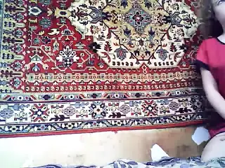 Beautiful Russian girl fuck on the background of the carpet