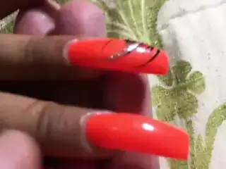 Latina with sexy long orange nails fingernails