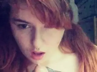 Redhead solo titfuck