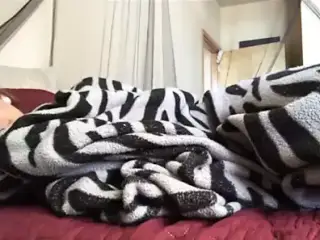 Girl farting under the covers