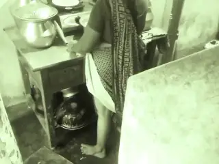 Husband presses breasts while Aunty Dinner is doing