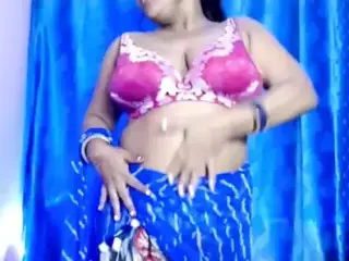 Desi Hot Sexy Beautiful Girl Opens Her Clothes and Bares Her Boobs and Does Erotic Dance.