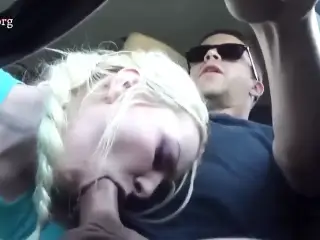 She sucks his cock while he drives the car