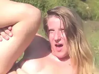 French couple fucking in open field
