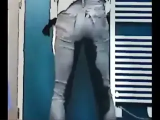 Emma pissing in tight jeans
