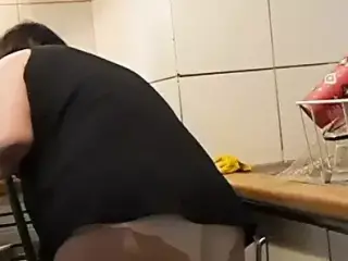 wife, in the kitchen without panties, washing tiles and unclogging the dishwasher