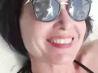 Julie sun bathing