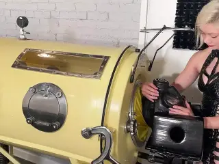 Latex gimp in the Iron Lung