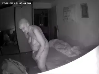 Granny jerks her pussy again late at night