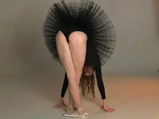 Flawless beauty ballerina Annett A with a flexible magnificent female body poses for me in a black stage costume. P-1(6)